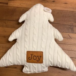 Christmas tree shaped pillow. Perfect for the “Joy” theme